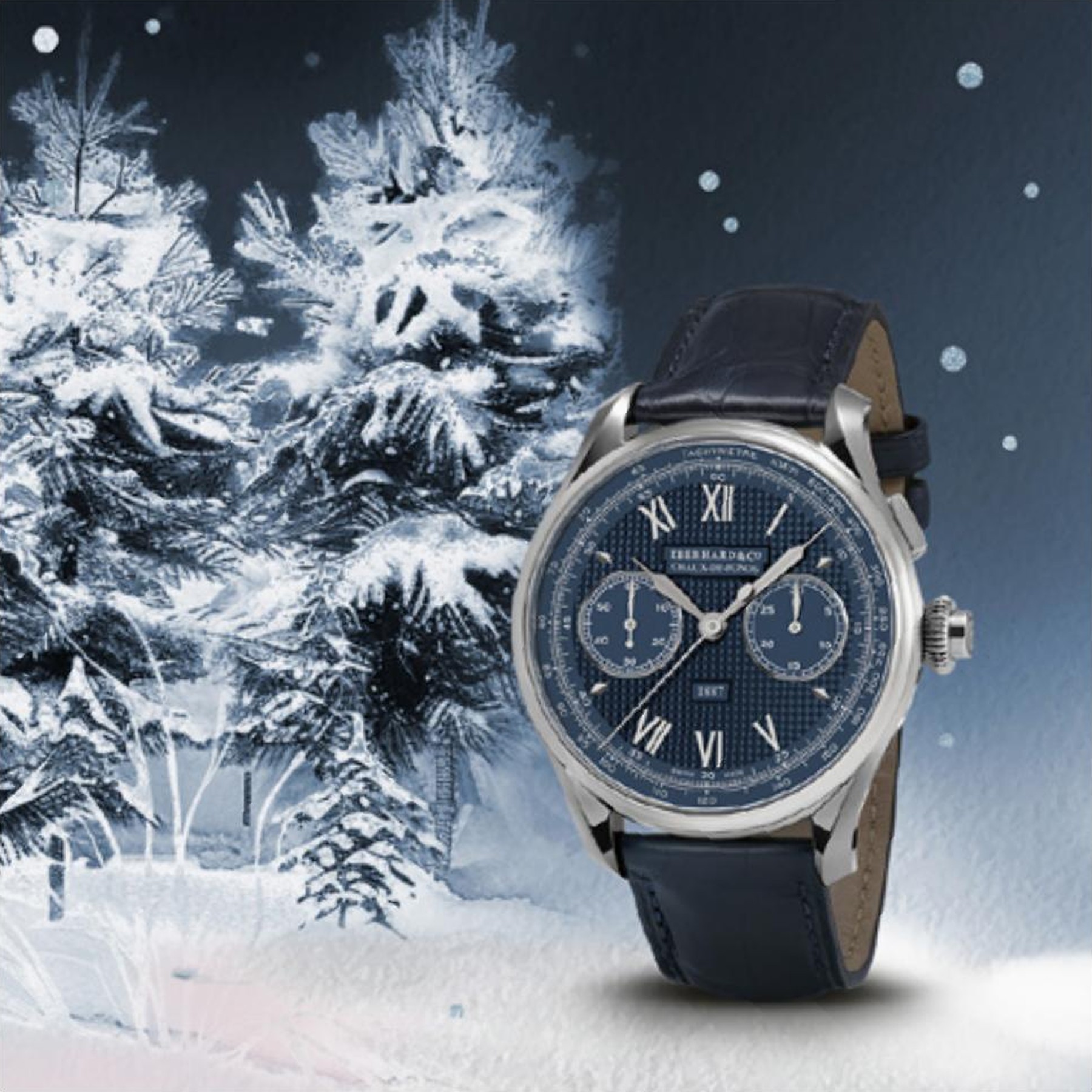 Concept Season's Greetings Eberhard & Co., cronografo quadrante blu su cinturino in pelle tra abeti innevati